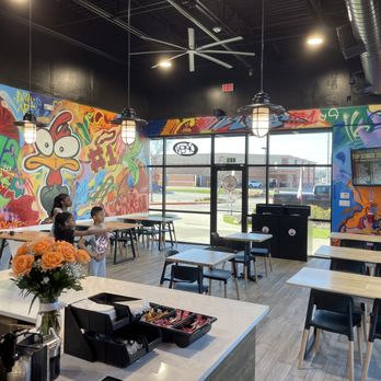 Lava Hot Chicken - Indoor seating and wall art - Chicken Wings Near Me - Rowlett, Texas