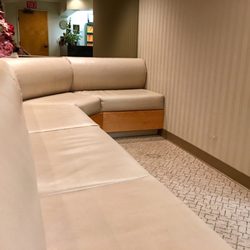 Neil C. Nunokawa, DDS - Waiting area & reception desk in the mirror reflection.  It's never filled because they're always on time! - VN