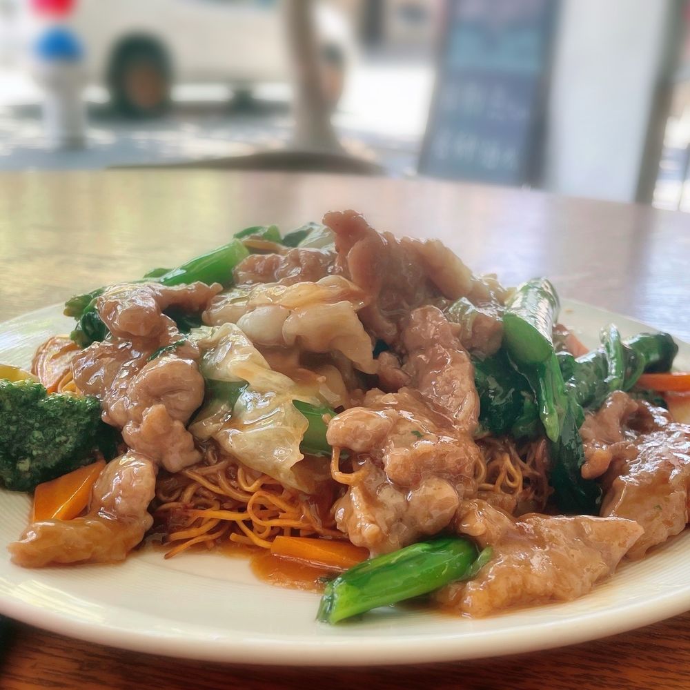 Osmanthus Dim Sum Lounge - Pan-fried crispy noodles with beef and veggies. - Cocktail Bars Near Me - San Francisco, California Osmanthus Dim Sum Lounge - Pan-fried crispy noodles with beef and veggies. - Cocktail Bars Near Me - San Francisco, California