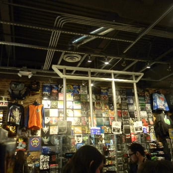 Hot Topic - folded T shirts hanging from the rafters - Men's Clothing Near Me - Sacramento, California