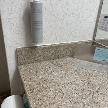 Hampton Inn San Marcos - The body wash dispenser located by the sink.  This should have been in the shower and lotion should be here - Hotels Near Me - San Marcos, California