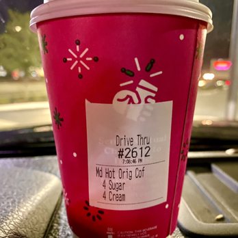 Dunkin' - a cup of coffee on a table - Coffee & Tea Near Me - Deland, Florida Dunkin' - a cup of coffee on a table - Coffee & Tea Near Me - Deland, Florida