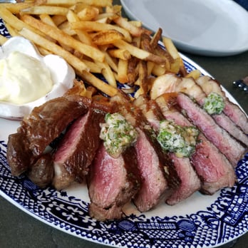 Bateau - New York Bone In steak that we asked to be cut with a side of frites. - Steakhouses Near Me - Seattle, Washington Bateau - New York Bone In steak that we asked to be cut with a side of frites. - Steakhouses Near Me - Seattle, Washington