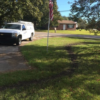 Pride Plumbing - This photo is a customers yard after a water line installation. - Plumbing Near Me Pride Plumbing - This photo is a customers yard after a water line installation. - Plumbing Near Me