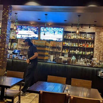 The Sweet Sap - The view of the bar and TV's - New American Near Me - Flushing, New York The Sweet Sap - The view of the bar and TV's - New American Near Me - Flushing, New York