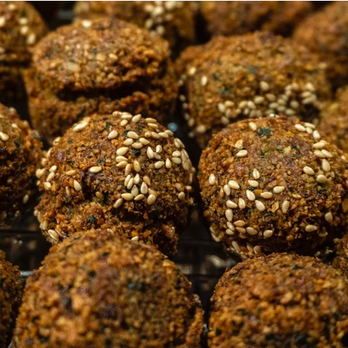 Hashtag Falafel - a close up of a pile of hashtagle balls - Falafel Near Me - Spring Valley, California Hashtag Falafel - a close up of a pile of hashtagle balls - Falafel Near Me - Spring Valley, California