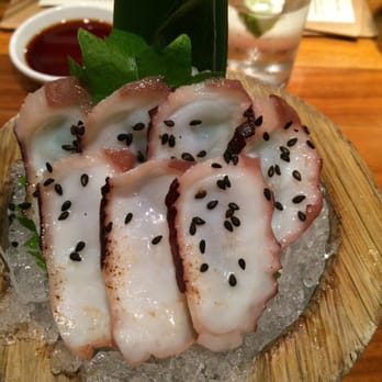 Uchi Austin - Lightly seared tako - oh so tender.  Black sesame seeds brought out the flavor without distracting.  Basically bacon of the sea - Sushi Bars Near Me - Austin, Texas