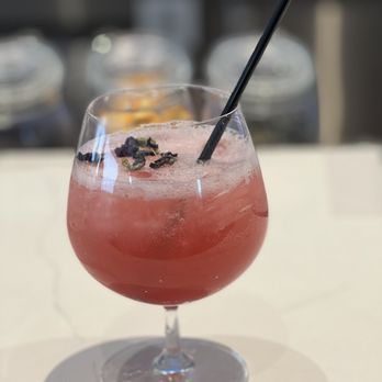Limani Grille - a close up of a glass with a drink in it - Mediterranean Near Me - Commack, New York Limani Grille - a close up of a glass with a drink in it - Mediterranean Near Me - Commack, New York