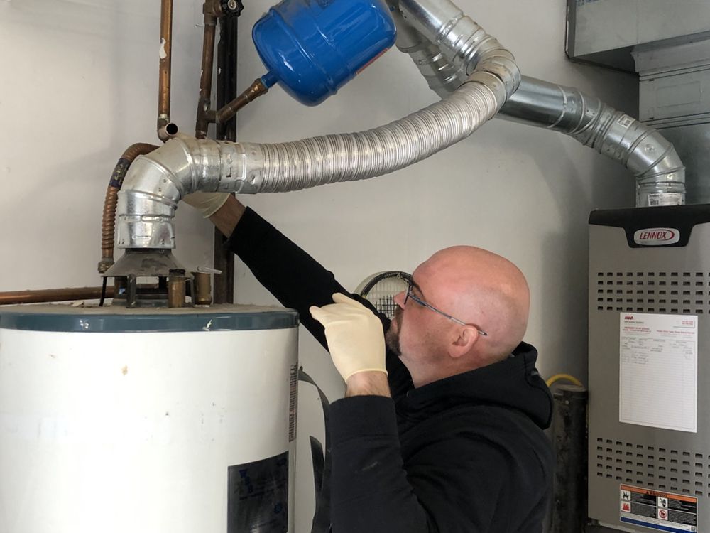 Slide of Mad Pipers Plumbing