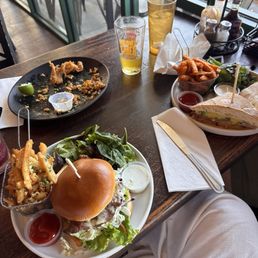 Spicy chicken sandwich, ribeye steak sandwich, and calamari Spicy chicken sandwich, ribeye steak sandwich, and calamari