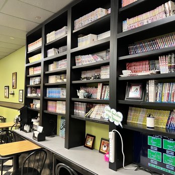Toshi's Cafe - Wall with Anime books and an old school Nintendo to play - Sushi Bars Near Me - Greensboro, North Carolina Toshi's Cafe - Wall with Anime books and an old school Nintendo to play - Sushi Bars Near Me - Greensboro, North Carolina