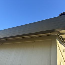 Solution used to clean roof was not rinsed off. Stained gutters with streaking. Solution removed finish from paint Solution used to clean roof was not rinsed off. Stained gutters with streaking. Solution removed finish from paint