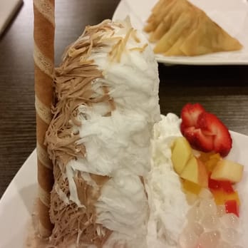 Frostcity - chocolate & haupia snow ice with an order of curry beef triangles. - Desserts Near Me - Honolulu, Hawaii Frostcity - chocolate & haupia snow ice with an order of curry beef triangles. - Desserts Near Me - Honolulu, Hawaii