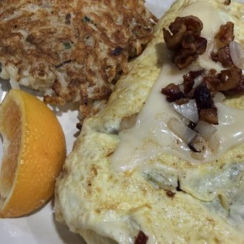 Sweetwater Cafe - Bacon, onion, mushroom, with Swiss cheese--omelette. - Breakfast & Brunch Near Me - Charleston, South Carolina Sweetwater Cafe - Bacon, onion, mushroom, with Swiss cheese--omelette. - Breakfast & Brunch Near Me - Charleston, South Carolina