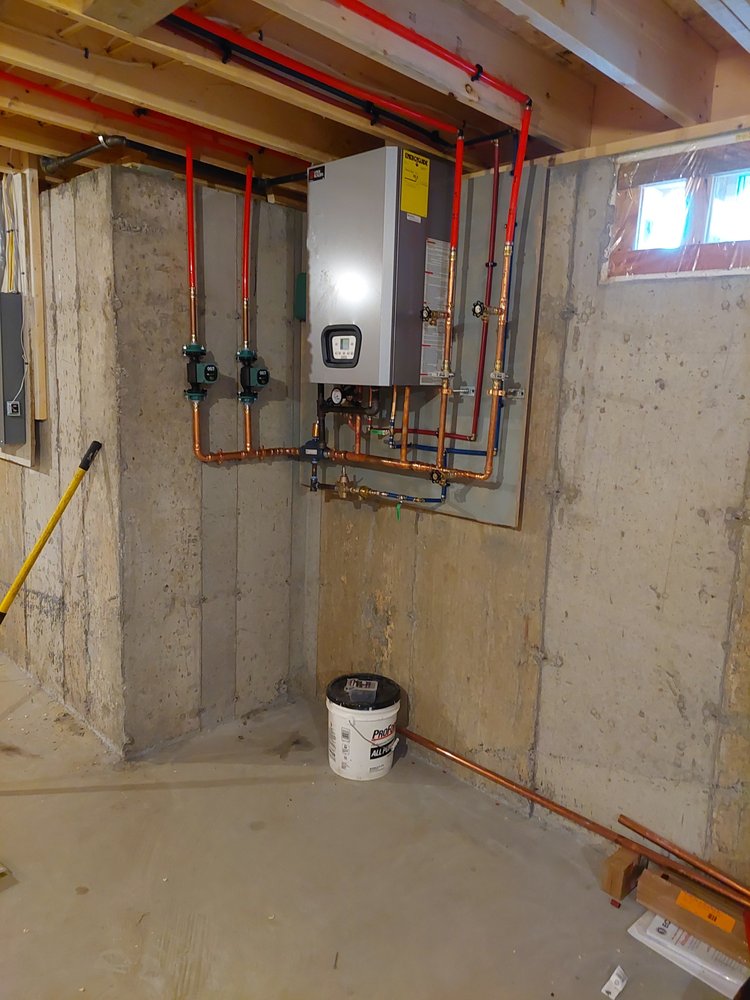Slide of TT and CA Plumbing and Heating