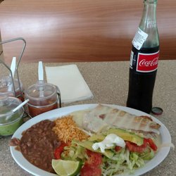 Taqueria Basurto - Chimichamga covered in in queso (cheese sauce) with un Coke de Mexico. Delicious