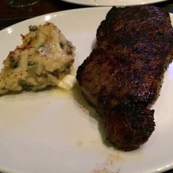 Del Frisco's Double Eagle Steakhouse - Ny strip steak with potato side dish. No juices and was cooked medium. - Steakhouses Near Me - Washington, DC, District of Columbia