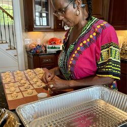 Angela making crab and crawfish ragoon from scratch.