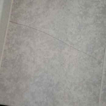 SEDA New Homes - Stress crack in the bathroom tile next to the toilet - General Contractors Near Me - Jacksonville, Florida SEDA New Homes - Stress crack in the bathroom tile next to the toilet - General Contractors Near Me - Jacksonville, Florida