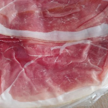 Angelo Caputo's Fresh Markets - 3 lbs of parma with some plastic hard edge on every piece that is not chewable what so ever. What is this?! Why can't I chew it? - Grocery Near Me - Hanover Park, Illinois