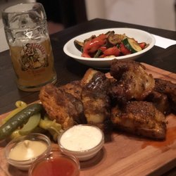 Restaurace U Dřevěného vlka - 2.2 pounds/1000 grams of pork ribs (only had one bone total!) with a side of vegetables