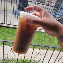 Their iced coffee w/ steamed oat milk Their iced coffee w/ steamed oat milk