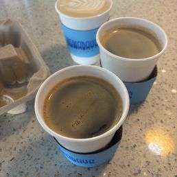 Two Americans and one vanilla latte. Two Americans and one vanilla latte.