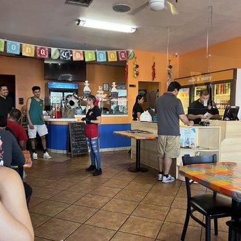 Birria Queen - a group of people in a restaurant - Mexican Near Me - Phoenix, Arizona