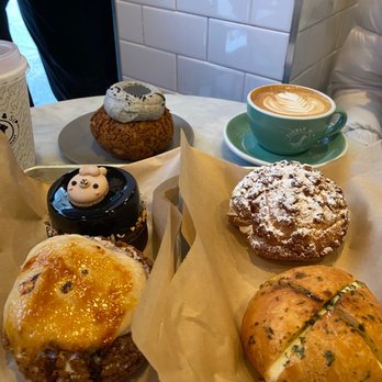 Bibble & Sip - Cream Puffs, Garlic Cream Cheese Bun, and Black Sesame Samoa Tart - Coffee & Tea Near Me - New York, New York Bibble & Sip - Cream Puffs, Garlic Cream Cheese Bun, and Black Sesame Samoa Tart - Coffee & Tea Near Me - New York, New York