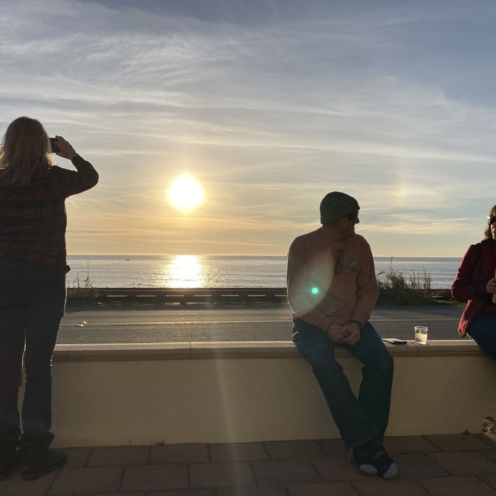 Watching the sunset outside our room Watching the sunset outside our room