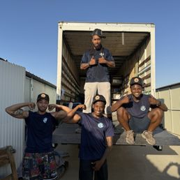 The boys moving the items!