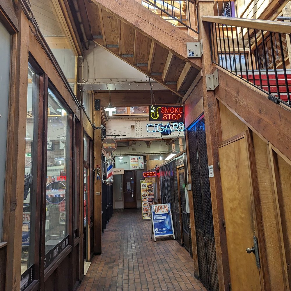Americana - the inside of a store with a staircase leading to the second floor - New American Near Me - Seattle, Washington