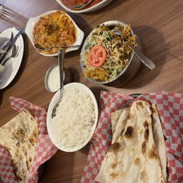 Butter Chicken Basmati Rice Garlic Naan Navratan Korma Shrimp Biryani