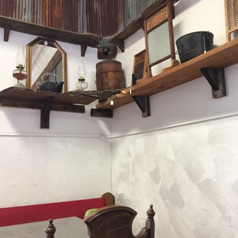 Hager's Market - a wooden table and shelves - Farmers Market Near Me - Independence, Kansas