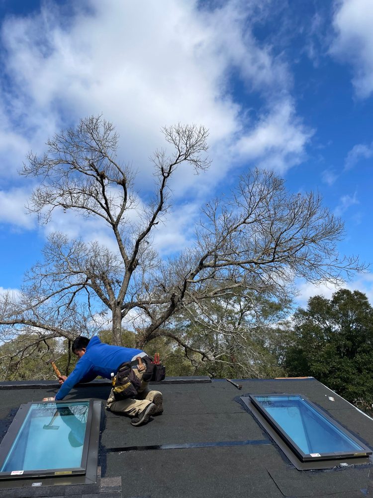 Slide of RainTight Roofing & Construction