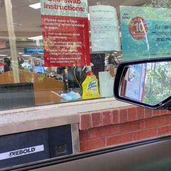 CVS Pharmacy - a car's side view mirror - Drugstores Near Me - Covington, Louisiana
