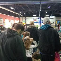 Long line no one to help us. 20min wait while employee was in back room trying to help another angry customer