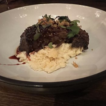 FM Eatery - Cheerwine braised ribs on top of grits - Cocktail Bars Near Me - Fort Mill, South Carolina FM Eatery - Cheerwine braised ribs on top of grits - Cocktail Bars Near Me - Fort Mill, South Carolina