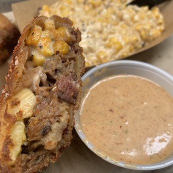 Sideways - The Cowboy Caboodle with a side of cream corn. - Barbeque Near Me - Rockwall, Texas Sideways - The Cowboy Caboodle with a side of cream corn. - Barbeque Near Me - Rockwall, Texas