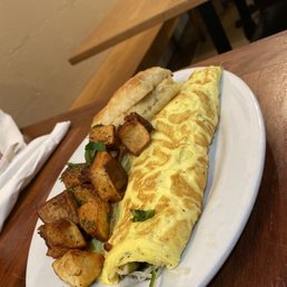 Amazing Omelette: Brussels sprouts, tomatoes, spinach and gruyere cheese. The BEST herb potatoes you'll ever eat, and delicious biscuit. Amazing Omelette: Brussels sprouts, tomatoes, spinach and gruyere cheese. The BEST herb potatoes you'll ever eat, and delicious biscuit.