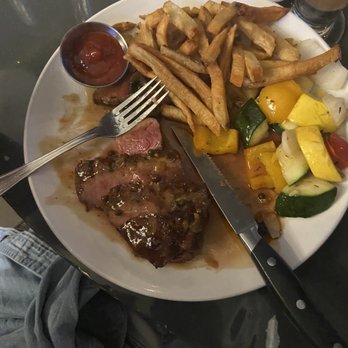 Idletyme - Steak up close. Supposed to be medium rare, fries unsalted, but no salt on the table, veggies not seasoned and they were supposed to be. - American Near Me - Stowe, Vermont