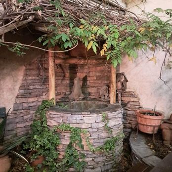 O'Malley's On Main - Wishing well on the back patio - Irish Near Me - Seal Beach, California O'Malley's On Main - Wishing well on the back patio - Irish Near Me - Seal Beach, California