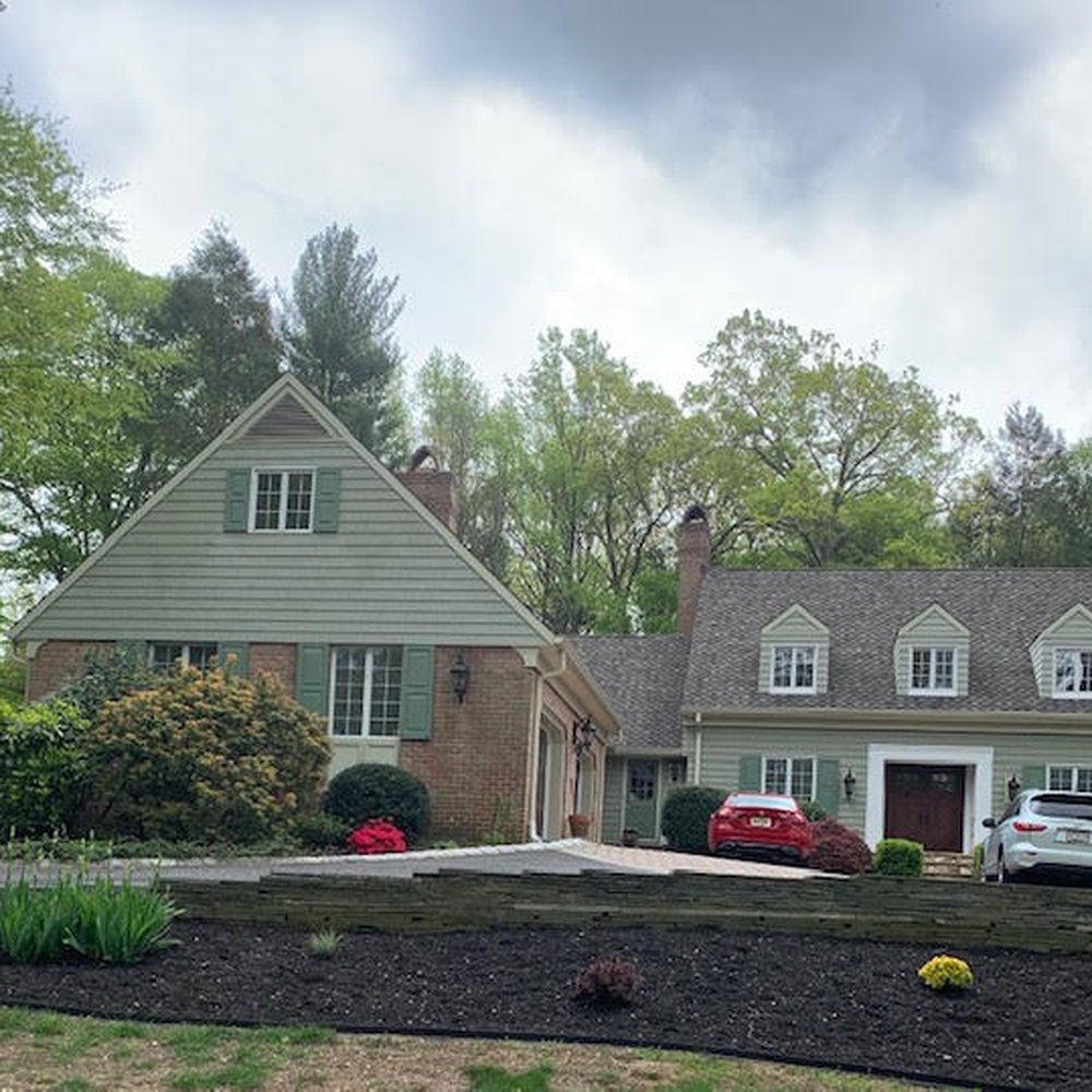 Colonial Nursery - The Iris on the left was already there.  Note "size" of plants installed - Nurseries & Gardening Near Me - Lincroft, New Jersey