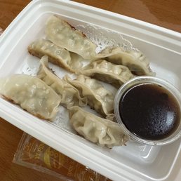 dumplings in a styrofoam container