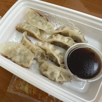 Asian Cafe - dumplings in a styrofoam container - Pan Asian Near Me - Fayetteville, New York