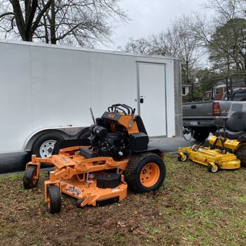 Sean's Lawn Care - two lawn mowers and a trailer - Lawn Services Near Me Sean's Lawn Care - two lawn mowers and a trailer - Lawn Services Near Me