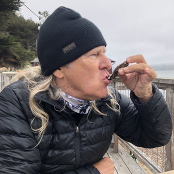 Nick's Cove - RB enjoying his oyster - Seafood Near Me - Marshall, California Nick's Cove - RB enjoying his oyster - Seafood Near Me - Marshall, California