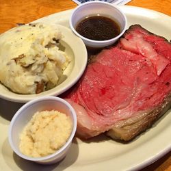 Texas Roadhouse - 12 oz. rare prime rib with straight horseradish au jus, and mashed potatoes. Delicious!