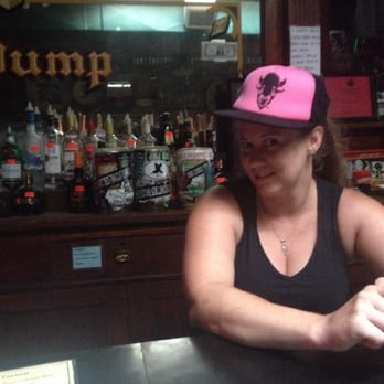 Town Pump Tavern - a woman sitting at a bar - Bars Near Me - Black Mountain, North Carolina Town Pump Tavern - a woman sitting at a bar - Bars Near Me - Black Mountain, North Carolina