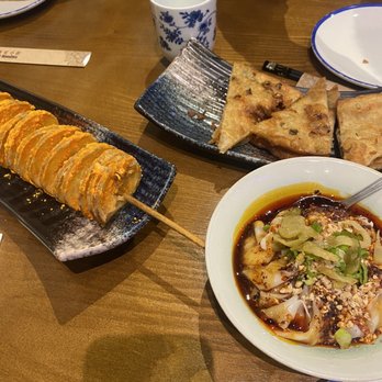 Yu Noodles - Potato Tower (cheese), S1. Scallion Pancake, S7. Spicy Oil Wonton - Chinese Near Me - Herndon, Virginia Yu Noodles - Potato Tower (cheese), S1. Scallion Pancake, S7. Spicy Oil Wonton - Chinese Near Me - Herndon, Virginia